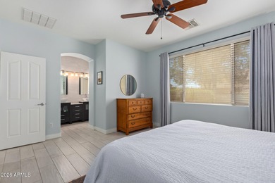 Nestled within the gated community of Seville, this beautifully on Seville Golf and Country Club in Arizona - for sale on GolfHomes.com, golf home, golf lot