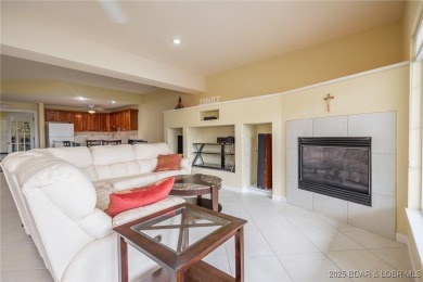 Experience elevated lakefront living at Lake of the Ozarks! One on Seasons Ridge At Four Seasons in Missouri - for sale on GolfHomes.com, golf home, golf lot
