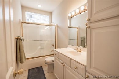Experience elevated lakefront living at Lake of the Ozarks! One on Seasons Ridge At Four Seasons in Missouri - for sale on GolfHomes.com, golf home, golf lot