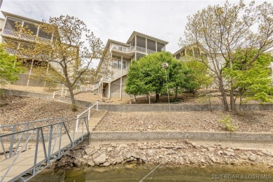 Experience elevated lakefront living at Lake of the Ozarks! One on Seasons Ridge At Four Seasons in Missouri - for sale on GolfHomes.com, golf home, golf lot