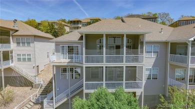 Experience elevated lakefront living at Lake of the Ozarks! One on Seasons Ridge At Four Seasons in Missouri - for sale on GolfHomes.com, golf home, golf lot