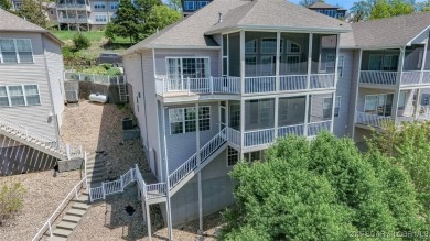 Experience elevated lakefront living at Lake of the Ozarks! One on Seasons Ridge At Four Seasons in Missouri - for sale on GolfHomes.com, golf home, golf lot