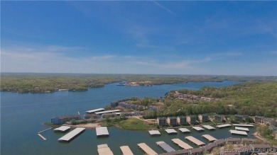 Experience elevated lakefront living at Lake of the Ozarks! One on Seasons Ridge At Four Seasons in Missouri - for sale on GolfHomes.com, golf home, golf lot