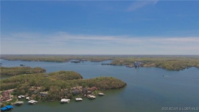 Experience elevated lakefront living at Lake of the Ozarks! One on Seasons Ridge At Four Seasons in Missouri - for sale on GolfHomes.com, golf home, golf lot
