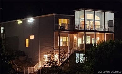 Experience elevated lakefront living at Lake of the Ozarks! One on Seasons Ridge At Four Seasons in Missouri - for sale on GolfHomes.com, golf home, golf lot