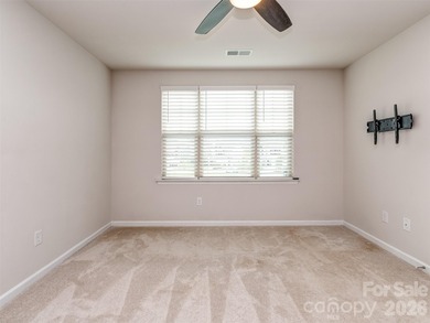 Welcome home to Killian Creek! Large, rocking chair, covered on Verdict Ridge Golf and Country Club in North Carolina - for sale on GolfHomes.com, golf home, golf lot