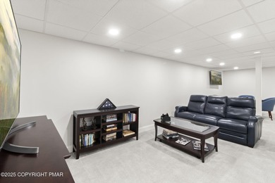 Step into a bright and inviting Skytop home where openness on Skytop Lodge Golf Course in Pennsylvania - for sale on GolfHomes.com, golf home, golf lot