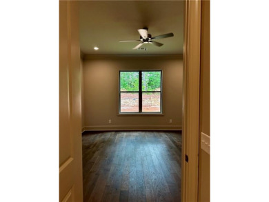 Nestled within Windsor Village, you'll find Pickleball courts on Grand National Golf Course in Alabama - for sale on GolfHomes.com, golf home, golf lot