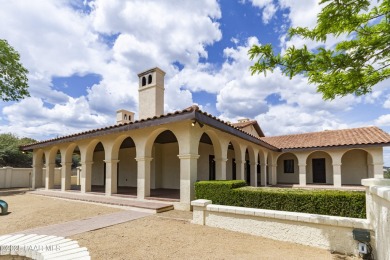 Discover a rare fusion of old-world elegance & cutting-edge on StoneRidge Golf Course in Arizona - for sale on GolfHomes.com, golf home, golf lot