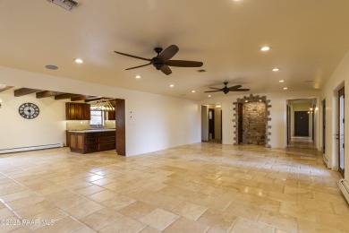 Discover a rare fusion of old-world elegance & cutting-edge on StoneRidge Golf Course in Arizona - for sale on GolfHomes.com, golf home, golf lot