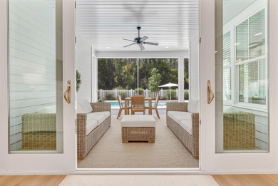 This elegant single-story Hawthorne plan by Huff Homes combines on Origins Golf Club in Florida - for sale on GolfHomes.com, golf home, golf lot