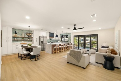 Live lakeside luxury every day in this breathtakingly remodeled on Lake San Marcos Country Club- South Course in California - for sale on GolfHomes.com, golf home, golf lot