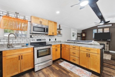 Come on over and look at this recently remodeled home in the on Tidewater Golf Club and Plantation in South Carolina - for sale on GolfHomes.com, golf home, golf lot