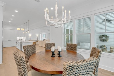 This elegant single-story Hawthorne plan by Huff Homes combines on Origins Golf Club in Florida - for sale on GolfHomes.com, golf home, golf lot