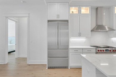 This elegant single-story Hawthorne plan by Huff Homes combines on Origins Golf Club in Florida - for sale on GolfHomes.com, golf home, golf lot
