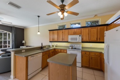 Welcome to maintenance-free living in the heart of Greenfield on Links At Greenfield Plantation in Florida - for sale on GolfHomes.com, golf home, golf lot