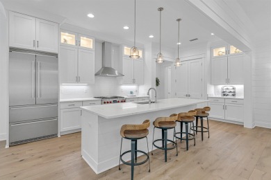 This elegant single-story Hawthorne plan by Huff Homes combines on Origins Golf Club in Florida - for sale on GolfHomes.com, golf home, golf lot