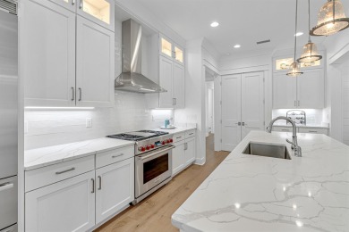 This elegant single-story Hawthorne plan by Huff Homes combines on Origins Golf Club in Florida - for sale on GolfHomes.com, golf home, golf lot