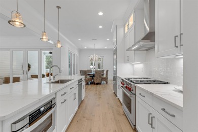 This elegant single-story Hawthorne plan by Huff Homes combines on Origins Golf Club in Florida - for sale on GolfHomes.com, golf home, golf lot