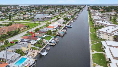 Welcome to your gorgeous coastal retreat!  This beautifully on Gulf Harbors Golf Course in Florida - for sale on GolfHomes.com, golf home, golf lot
