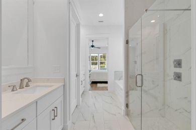 This elegant single-story Hawthorne plan by Huff Homes combines on Origins Golf Club in Florida - for sale on GolfHomes.com, golf home, golf lot