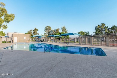 Enjoy this beautifully upgraded home with quartz counters and on Cave Creek Municipal Golf Course in Arizona - for sale on GolfHomes.com, golf home, golf lot