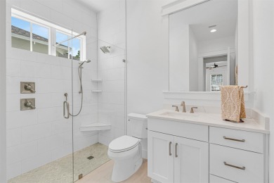 This elegant single-story Hawthorne plan by Huff Homes combines on Origins Golf Club in Florida - for sale on GolfHomes.com, golf home, golf lot