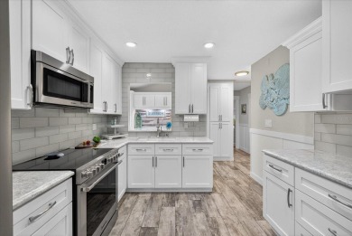 Welcome to your gorgeous coastal retreat!  This beautifully on Gulf Harbors Golf Course in Florida - for sale on GolfHomes.com, golf home, golf lot