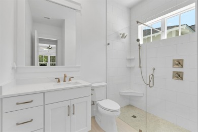 This elegant single-story Hawthorne plan by Huff Homes combines on Origins Golf Club in Florida - for sale on GolfHomes.com, golf home, golf lot