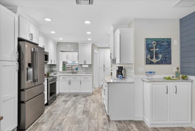 Welcome to your gorgeous coastal retreat!  This beautifully on Gulf Harbors Golf Course in Florida - for sale on GolfHomes.com, golf home, golf lot