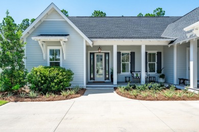 This elegant single-story Hawthorne plan by Huff Homes combines on Origins Golf Club in Florida - for sale on GolfHomes.com, golf home, golf lot