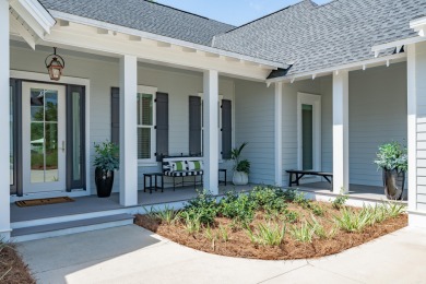 This elegant single-story Hawthorne plan by Huff Homes combines on Origins Golf Club in Florida - for sale on GolfHomes.com, golf home, golf lot