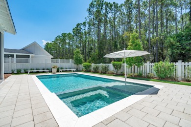 This elegant single-story Hawthorne plan by Huff Homes combines on Origins Golf Club in Florida - for sale on GolfHomes.com, golf home, golf lot
