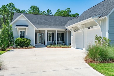 This elegant single-story Hawthorne plan by Huff Homes combines on Origins Golf Club in Florida - for sale on GolfHomes.com, golf home, golf lot