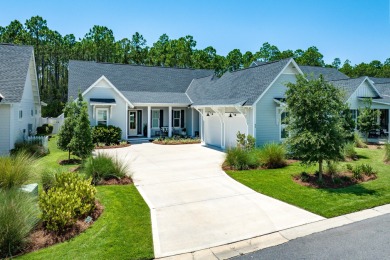 This elegant single-story Hawthorne plan by Huff Homes combines on Origins Golf Club in Florida - for sale on GolfHomes.com, golf home, golf lot