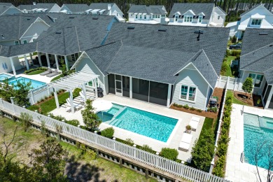 This elegant single-story Hawthorne plan by Huff Homes combines on Origins Golf Club in Florida - for sale on GolfHomes.com, golf home, golf lot