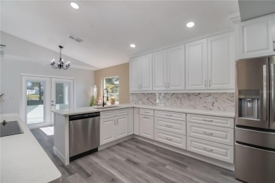 Are you looking for maintenance free living?  Then this one is on Royal Oaks Golf Club in Florida - for sale on GolfHomes.com, golf home, golf lot
