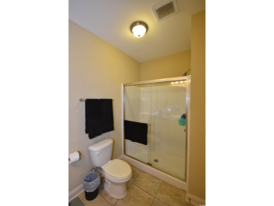 Welcome to this charming 3-bedroom, 2-bath condo in the heart of on The Tradition Golf Club in South Carolina - for sale on GolfHomes.com, golf home, golf lot