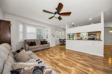 Under contract-accepting backup offers. From the elegant front on Heritage Pines Country Club in Florida - for sale on GolfHomes.com, golf home, golf lot