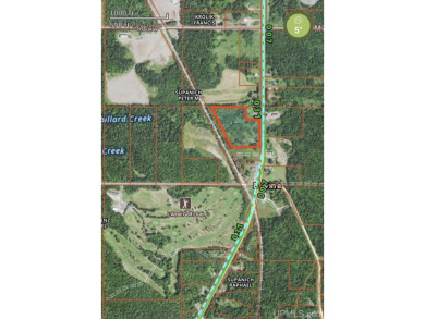 Here's a beautiful parcel located on the busy US-41 with on L Anse Golf Club in Michigan - for sale on GolfHomes.com, golf home, golf lot