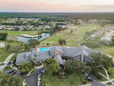 Under contract-accepting backup offers. From the elegant front on Heritage Pines Country Club in Florida - for sale on GolfHomes.com, golf home, golf lot