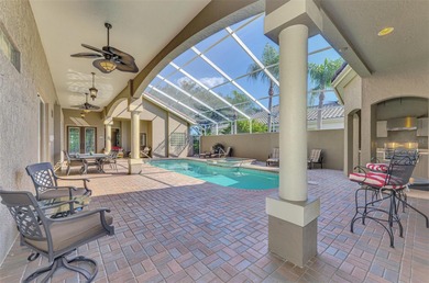 This elegant residence, located in one of Sarasota's most on Laurel Oak Country Club in Florida - for sale on GolfHomes.com, golf home, golf lot