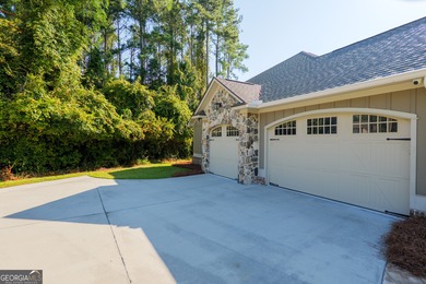 Welcome to your dream oasis! This luxury home boasts on Stone Creek Golf Club in Georgia - for sale on GolfHomes.com, golf home, golf lot