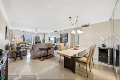Enjoy golf views from a private screened patio in this updated on Palm-Aire Country Club and Resort - The Oaks in Florida - for sale on GolfHomes.com, golf home, golf lot