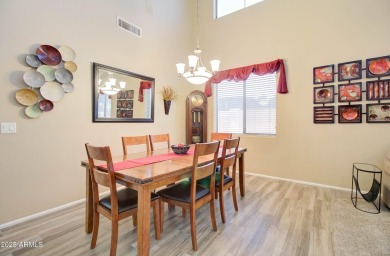 This gorgeous 4 bedroom, 3 bath home with a pool in the growing on The Golf Club At Johnson Ranch in Arizona - for sale on GolfHomes.com, golf home, golf lot