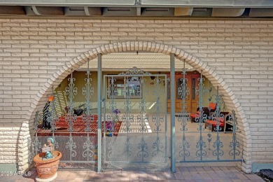 The Brick Driveway Welcomes You To An Enclosed Courtyard on Sun City Lakes West and East in Arizona - for sale on GolfHomes.com, golf home, golf lot