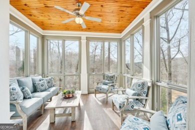 Welcome to 1259 Birch River Drive, a unique masterpiece nestled on Achasta Golf Club in Georgia - for sale on GolfHomes.com, golf home, golf lot