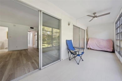 Stunning unit in Wynmoor! Overlooking scenic golf course, this on Wynmoor Golf Course in Florida - for sale on GolfHomes.com, golf home, golf lot