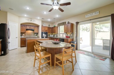 This gorgeous 4 bedroom, 3 bath home with a pool in the growing on The Golf Club At Johnson Ranch in Arizona - for sale on GolfHomes.com, golf home, golf lot