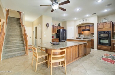 This gorgeous 4 bedroom, 3 bath home with a pool in the growing on The Golf Club At Johnson Ranch in Arizona - for sale on GolfHomes.com, golf home, golf lot